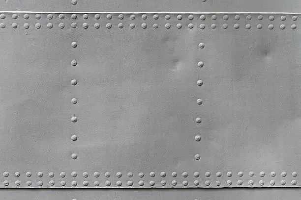 Photo of old metal texture with rivets
