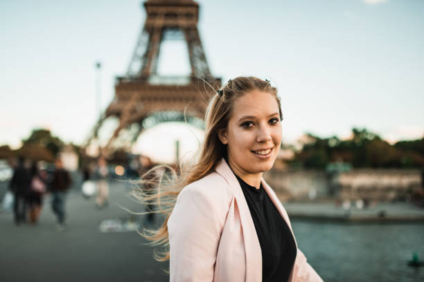 istock tourist in paris with eiffel tower in the background 1660022328