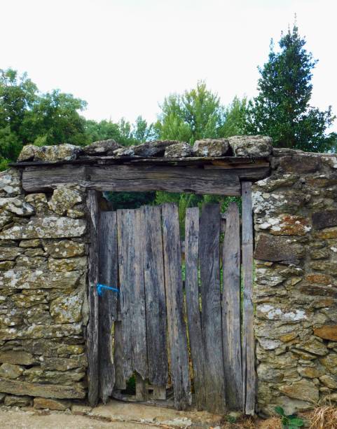 istock ancient door in rural landscapes 1660028787