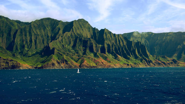 Sailboating past the Napali coast, Kauai stock photo