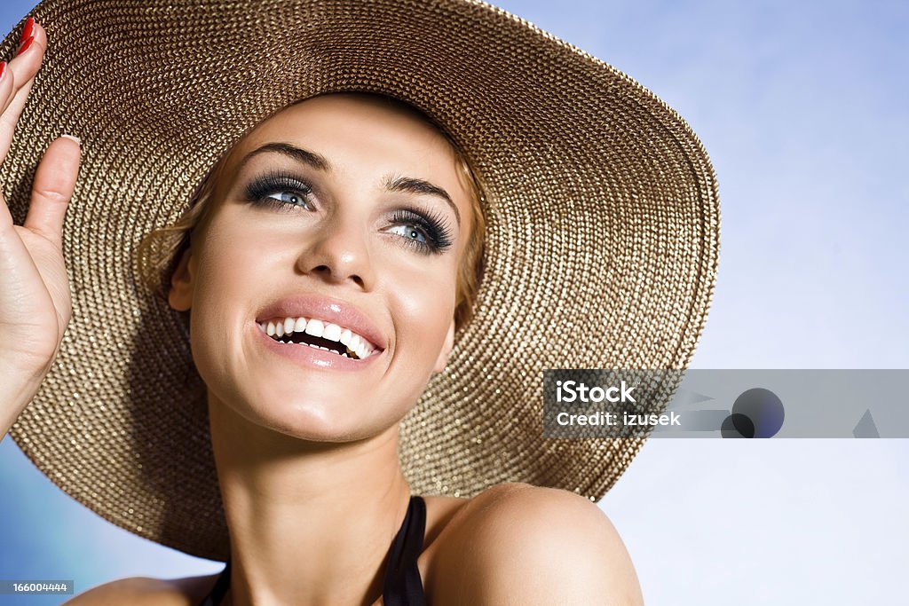Summer portrait Summer portrait of smiling beautiful young woman wearing straw hat. Close up Beauty Stock Photo