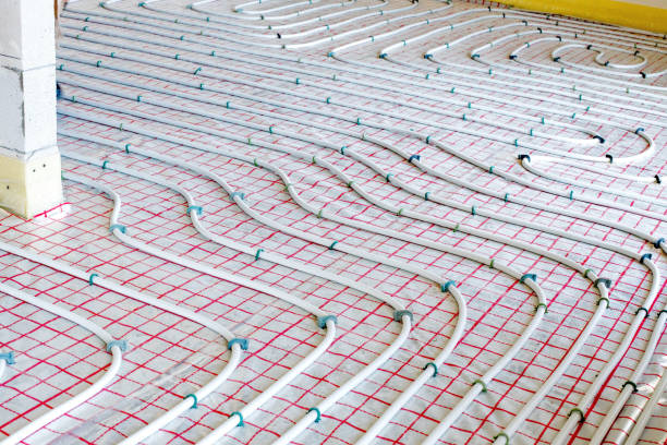 istock Installation of underfloor heating pipes for water heating. Heating systems. Pipes for underfloor heating. 1660075415