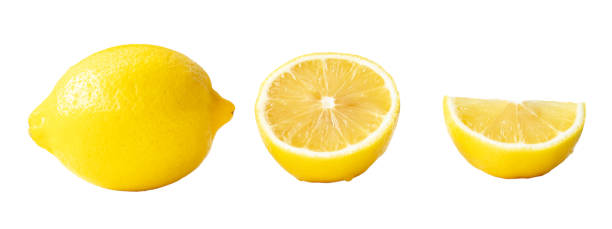 istock Single whole fresh beautiful yellow lemons with half slice isolated on white background with clipping path 1660131878
