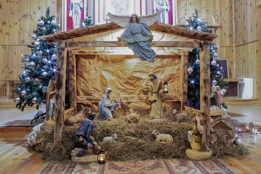 Christmas Manger scene with figurines including Jesus, Mary, Joseph, sheep and magi