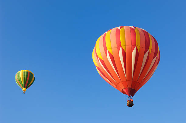 istock Hot Air Balloons Assending Into Sky 166015271