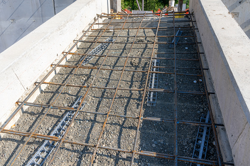 Metal reinforcement prepared for pouring concrete for concrete stairs. Close up.