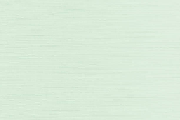 istock Green background of silk fabric satin wallpaper texture cotton canvas cloth pattern 1660206264