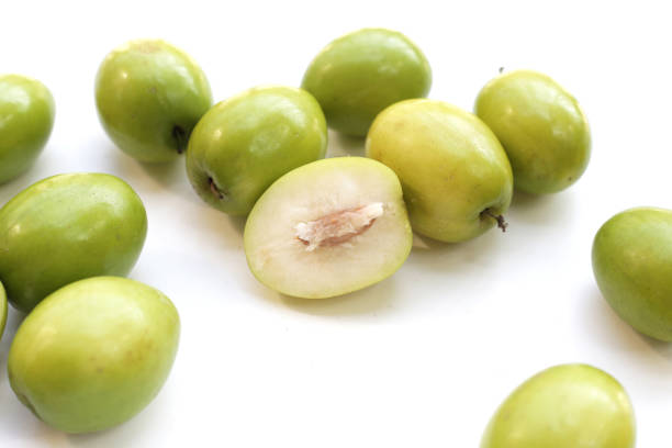 istock Green jujube fruits on white background. 1660227779
