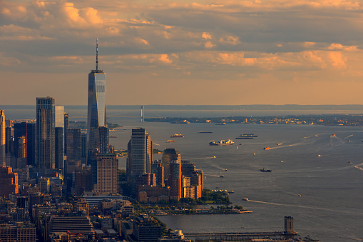 A view from the top of New York City, from the Edge building, during a golden sunset.