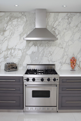 Interior of modern luxury kitchen in North American private residence.