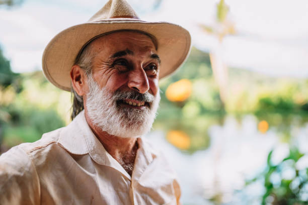 istock Farmer working on farm. Elderly Brazilian man. 1660289512