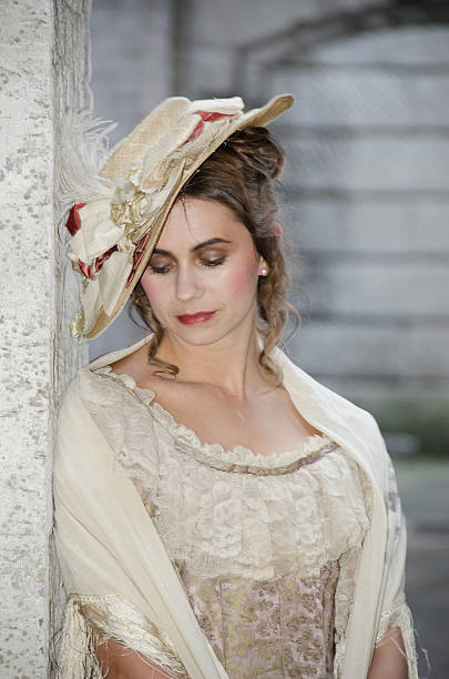 istock Sad Victorian Woman Looking Down 166029014