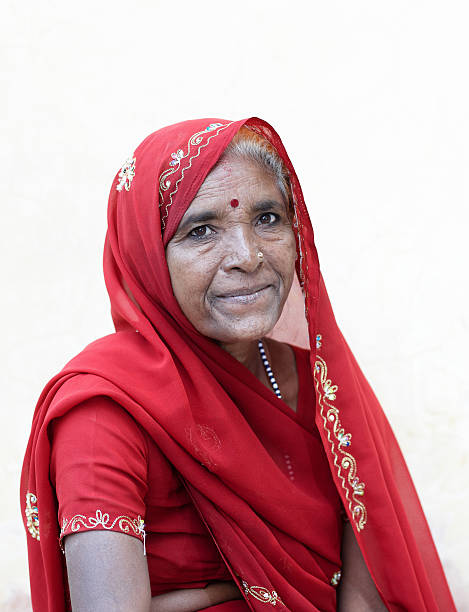 istock Mature asian woman in red headscarf 166031987