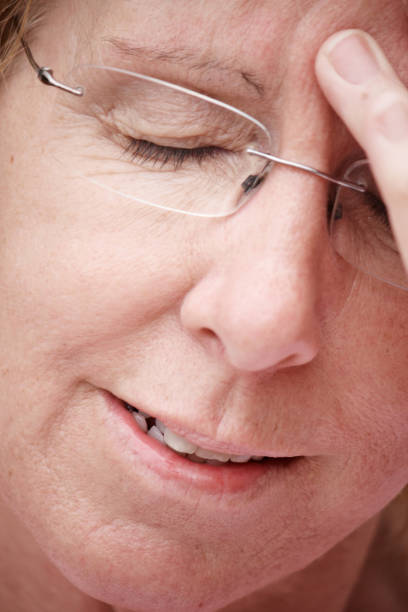 istock Mature woman with headache 166032040