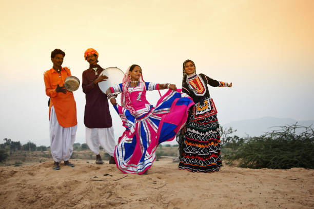 istock Indian dance troupe in Pushkar desert 166032132