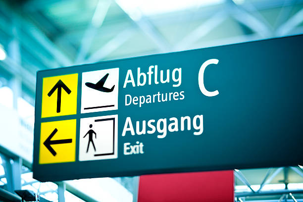 istock Departure and Exit signs board on airport 166036990