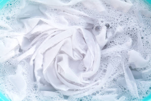 istock Soak a cloth before washing, white cloth 1660393836