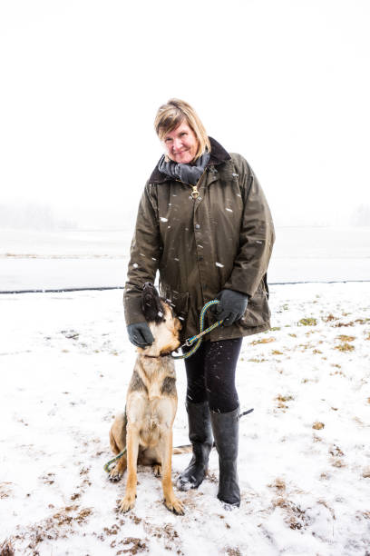 istock Out with the dog during a spring snowstorm 166041204