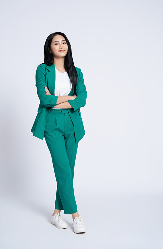 Portrait of young Asian business woman on white background