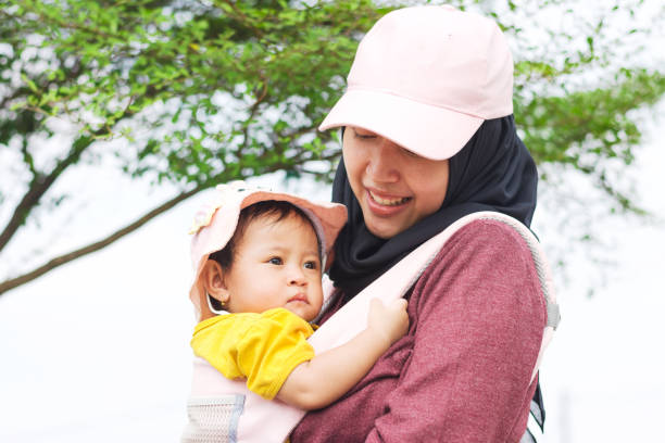 istock Happy Mother and Daughter under a Tree 1660438981