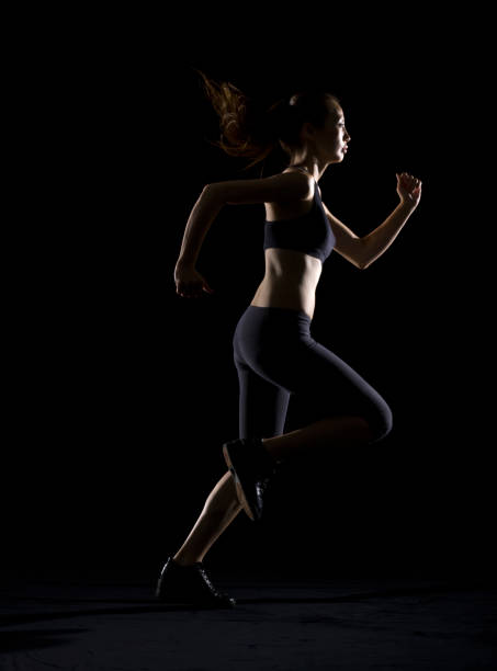 istock Silhouette of woman running 166044044