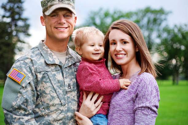 istock Army Family Series: Real American Soldier With Wife & Son 166044458