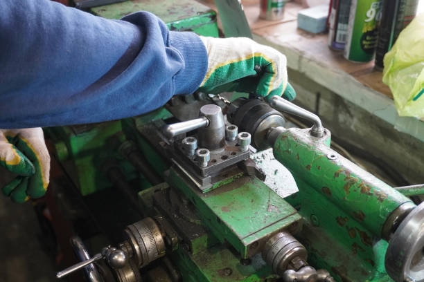 istock a man works in a garage with pieces of iron 1660445785