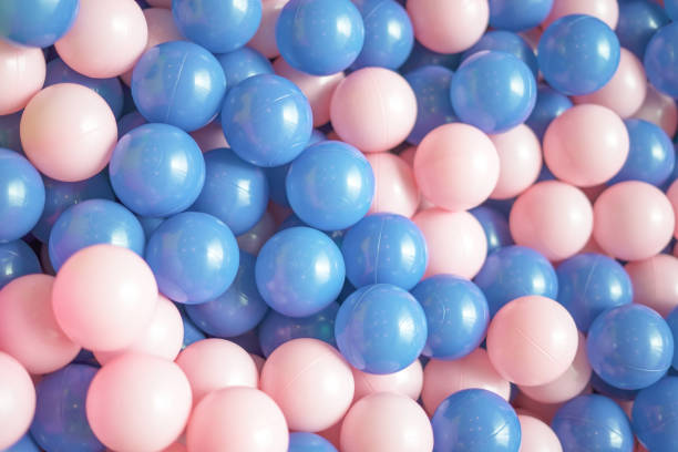 istock Lots of pink and blue balls background 1660478389