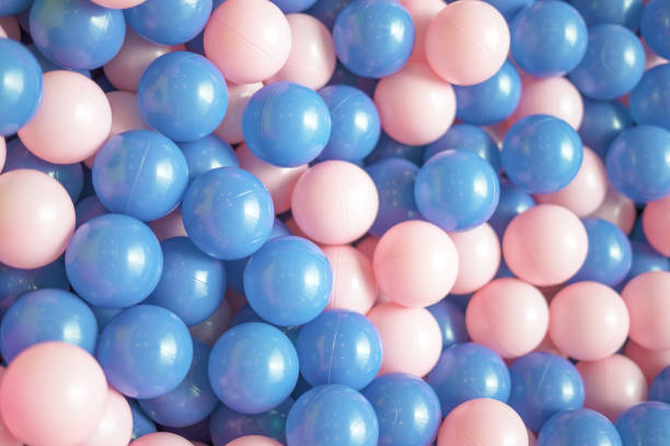 istock Lots of pink and blue balls background 1660478394