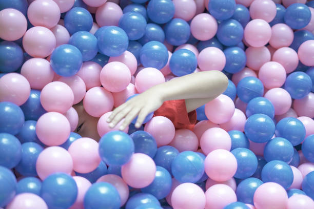 Girl's playing with balls