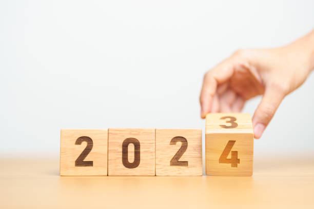 istock 2023 change to 2024 year block on table. goal, Resolution, strategy, plan, start, budget, mission, action, motivation and New Year concepts 1660525367