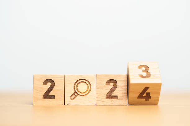 istock 2024 block with magnifying glass icon. SEO, Search Engine Optimization, hiring , Advertising, Idea, Strategy, marketing, Keyword, Content and New Year start concepts 1660525379