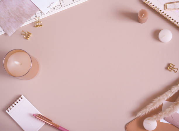 istock Autumn flat lay top view with pink beige background, cute feminine workspace, computer desk image 1660529757