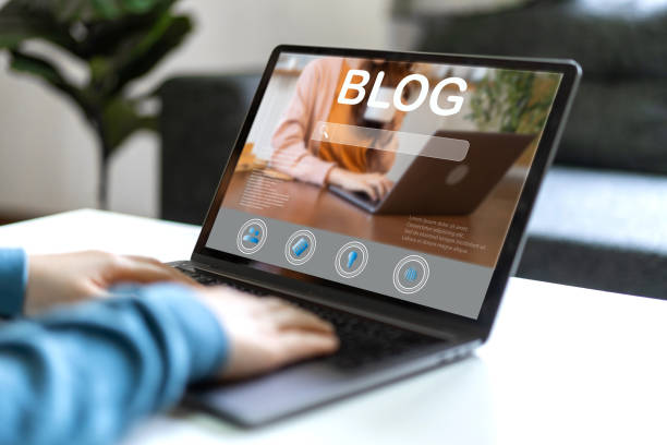 istock Social media online content, freelance worker, working online, content creator, woman using laptop, woman reading blog online on computer at home 1660541390