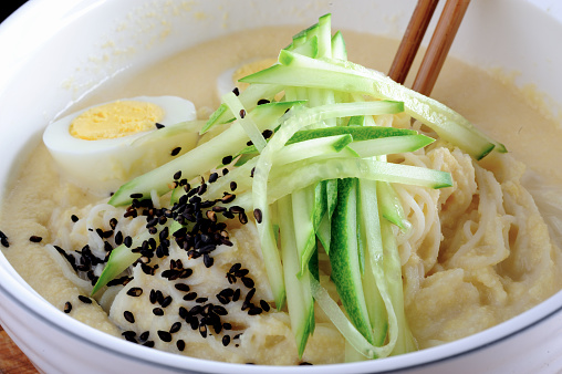 Asian Noodle in  ground soybean soup with cucumber and sesame, Korean Cuisine