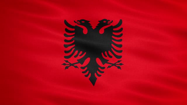Natural Waving Fabric Texture Of Albania National Flag Graphic Background