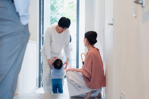 istock Dad visiting his hometown with his grandchildren 1660607769