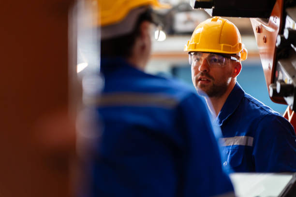 istock A team of engineers meeting to inspect computer-controlled steel welding robots 1660632796