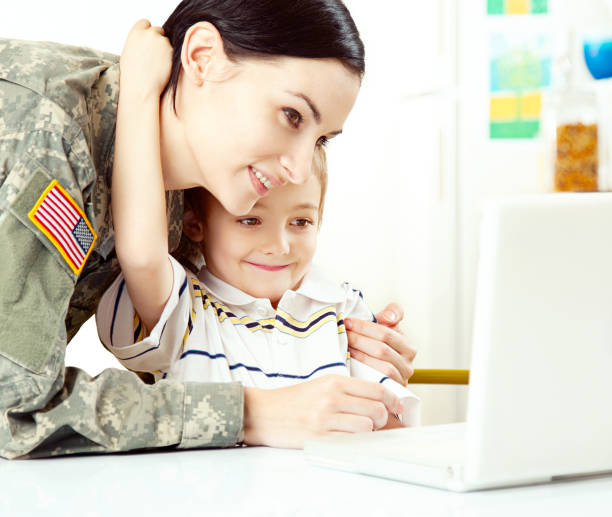 istock Female American Soldier with Son 166064122