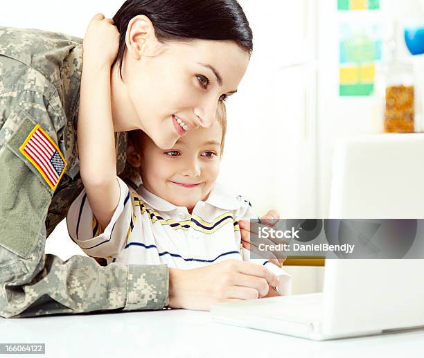 Female American Soldier With Son Stock Photo - Download Image Now - Adult, Child, Military