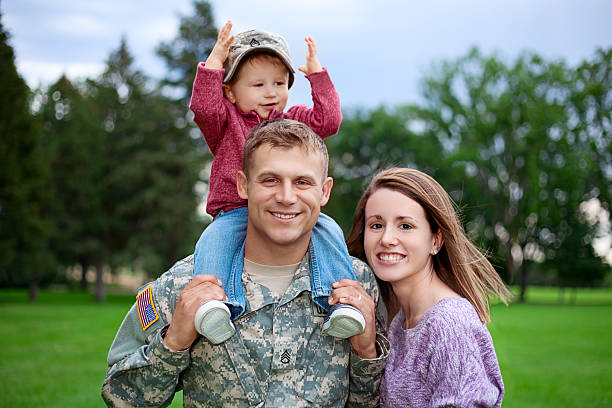 istock Army Family Series: Real American Soldier With Wife & Son 166064205