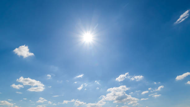 istock Panoramic view of clear blue sky and clouds, Blue sky background with tiny clouds. White fluffy clouds in the blue sky. Captivating stock photo featuring the mesmerizing beauty of the sky and clouds. 1660650921