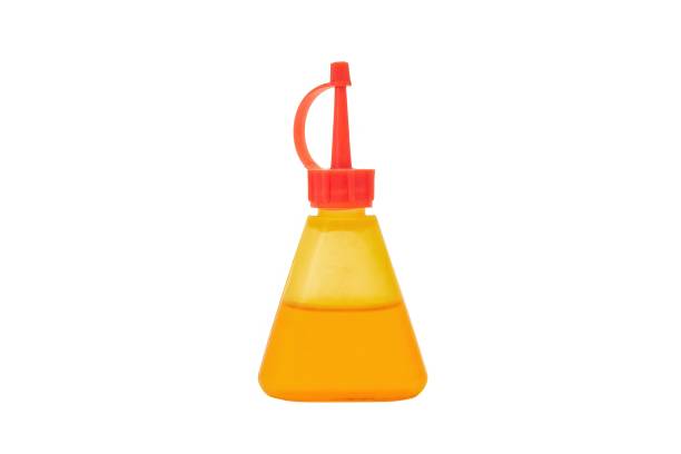istock a yellow plastic funnelling bottle with a red top and handles 1660656150