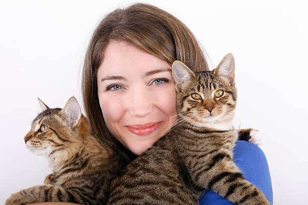 istock Pretty woman with cats 166066550