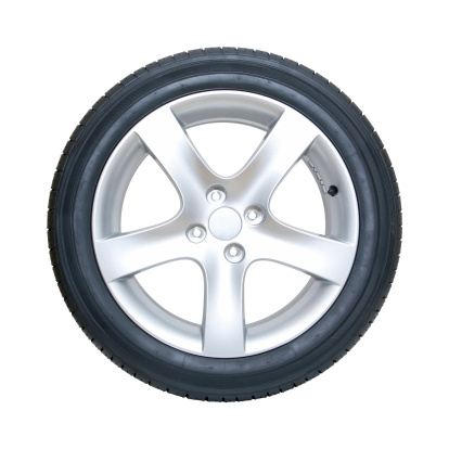 An automobile tire with wheel isolated on white background. 