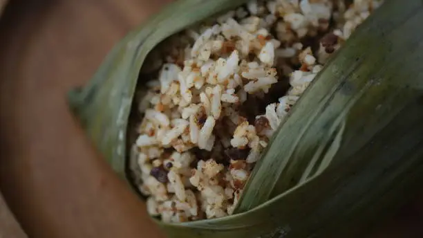 Tutug Oncom rice on bamboo tray. Tutug Oncom is a tradisional food from Tasimalaya city, Indonesia.