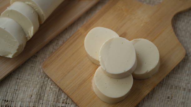 istock Japanese Silken tofu on a wooden choping board. 1660695811