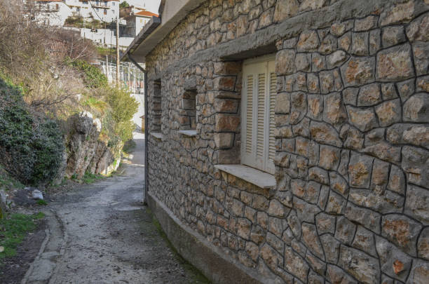 Traditional stone wall and windows in Arcadia, Greece