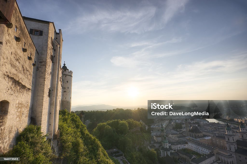 Castle Impressions - Summer Wide angle photo of the UNESCO-listed Hohensalzburg Fortress and historic center of Salzburg Austria in the last light of day. Architecture Stock Photo