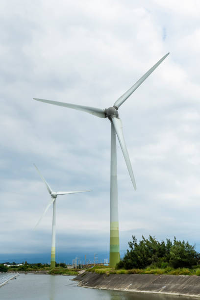 istock Wind power and solar power at Flood Detention Pond. 1660737134